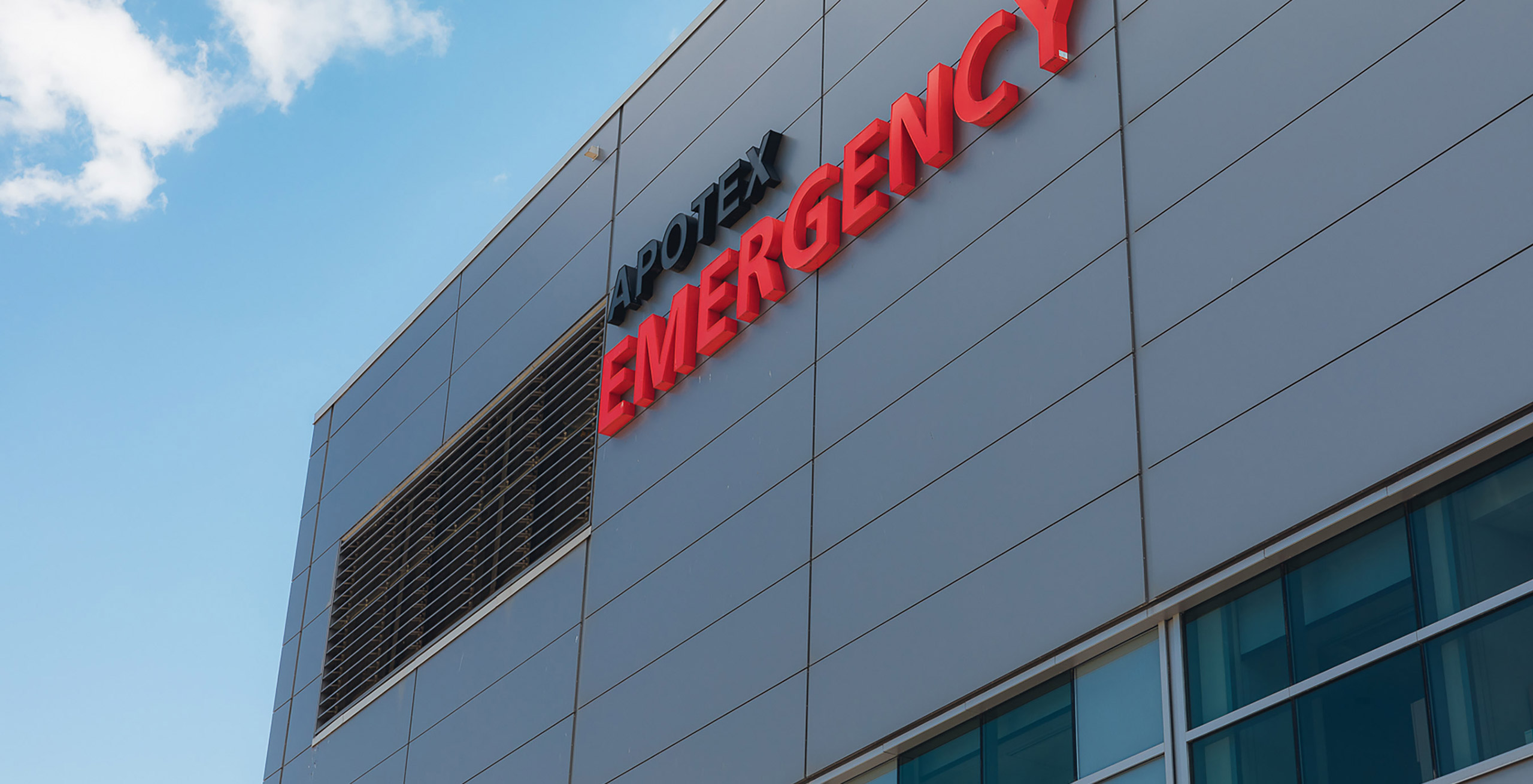 Image looking upward at the signage above the Apotex Emergency Department entrance